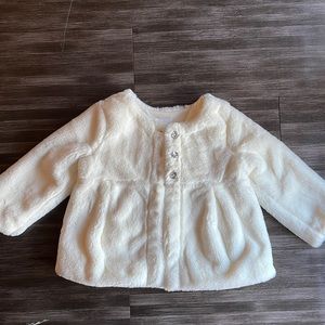Cream fodder faux-fur coat